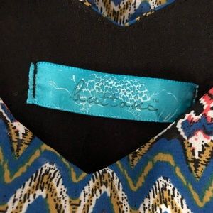 Peacock patterned mini dress